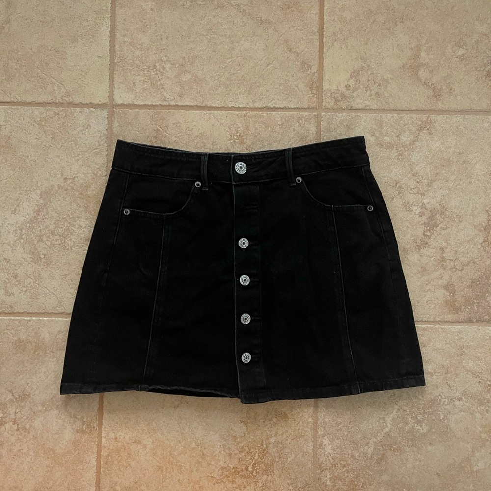 Black denim mini skirt